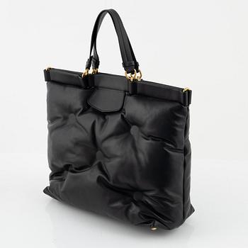 Maison Margiela, a black leather "Glam Slam" bag.