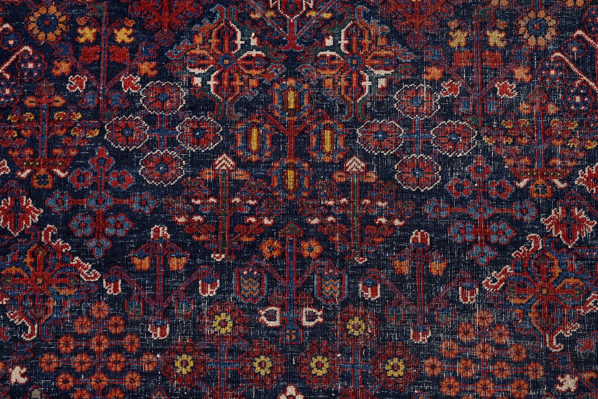 An oriental carpet, c. 360 x 270 cm.