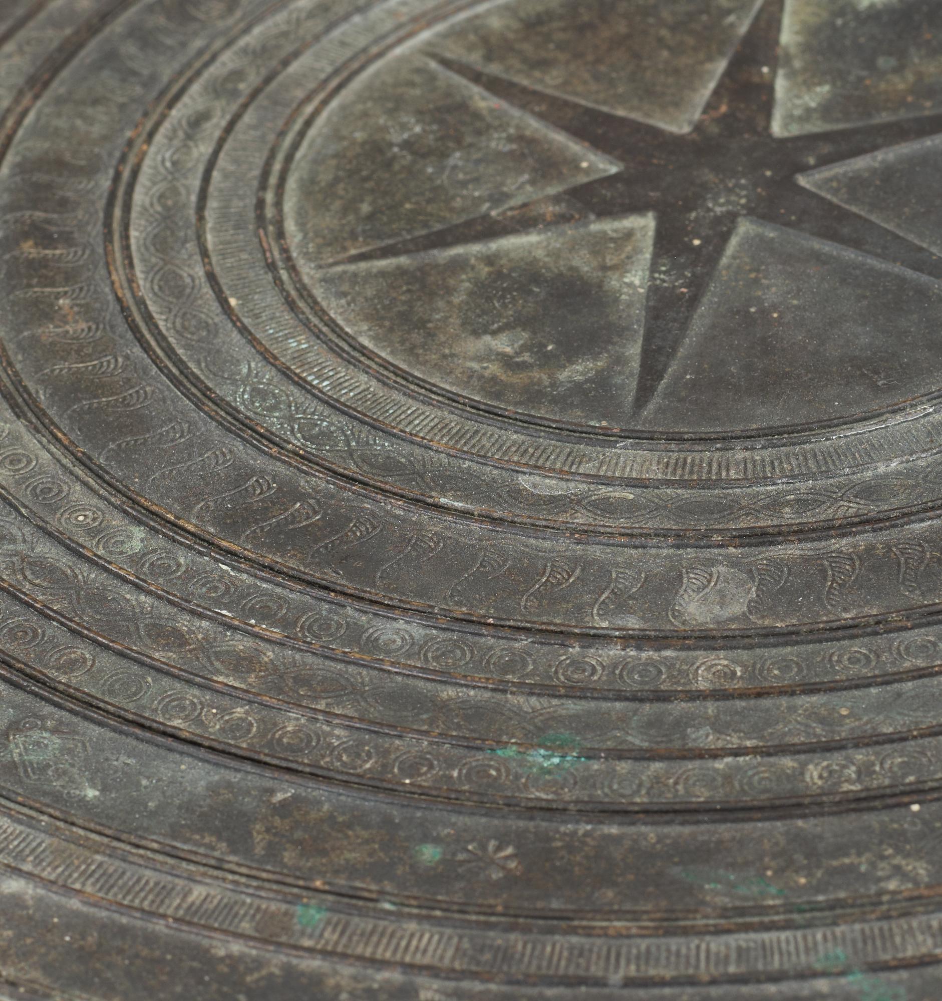 A Shan frog drum with a central star and four frogs on the tympanon, Myanmar, Laos or North Thailand, 19th Century.