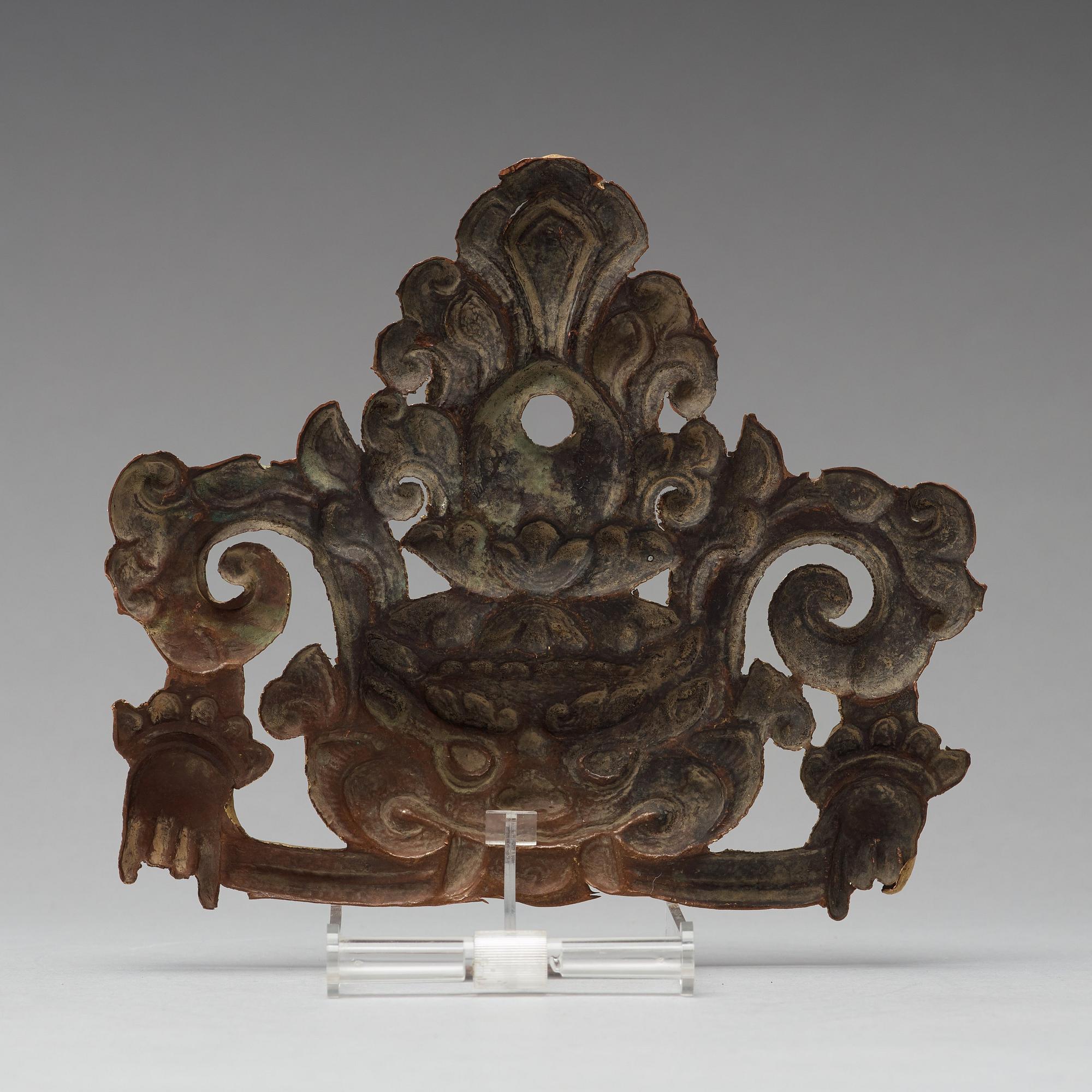 DEKORDEL, förgylld koppar legering. Tibet, troligen 1800-tal.