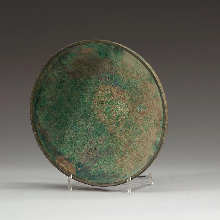 A Archaistic bronze lid for a dou vessel.