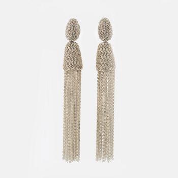 Oscar De La Renta, a pair of clip-on silver chain tassel earrings.