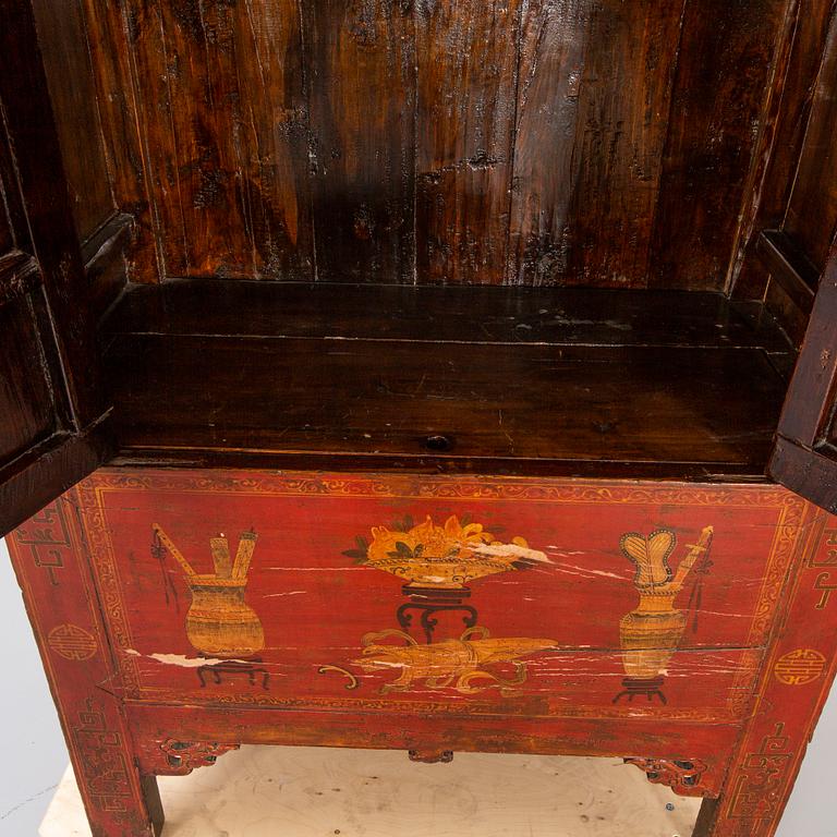 A 20th century Chinese painted wooden cabinet.