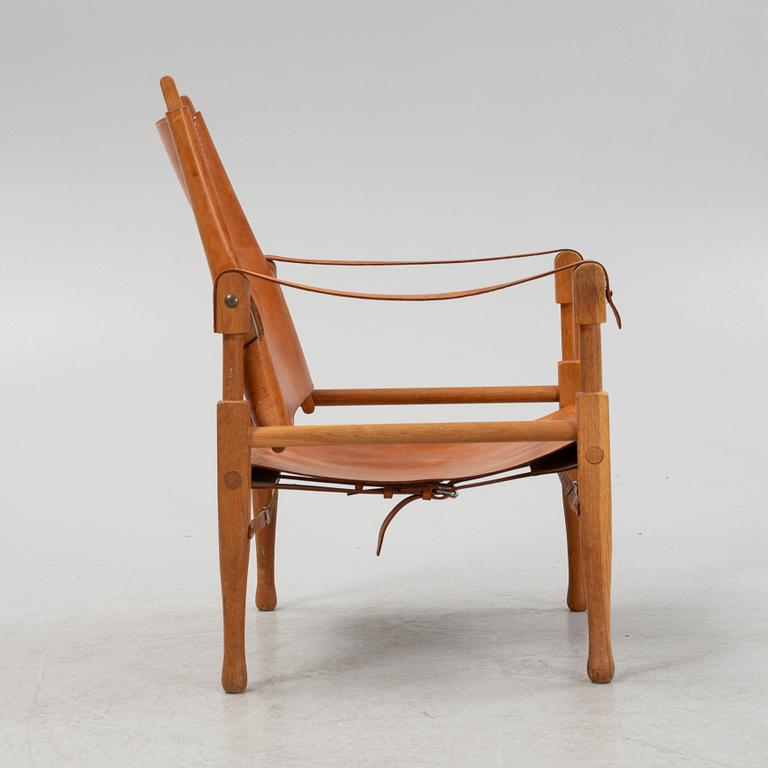 Scandianvian Modern, an oak and leather easy chair, mid 20th Century.