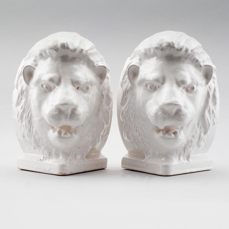 DEKORELEMENT, 2 st, till kakelugn, 1900-talets första hälft.