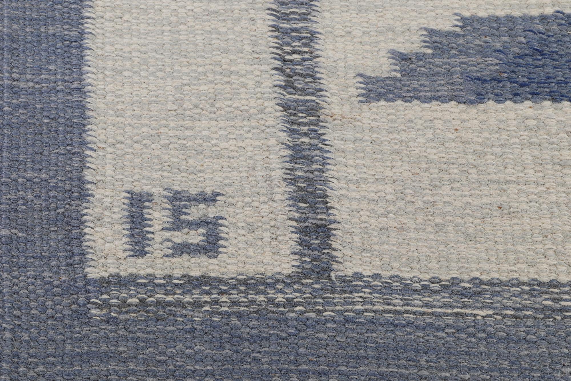 Ingegred Silow, a flat weave carpet, signed IS, ca 197 x 137 cm.