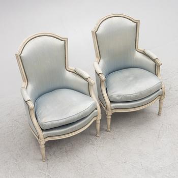 Bergeres, a pair, Louis XVI style, 20th century.