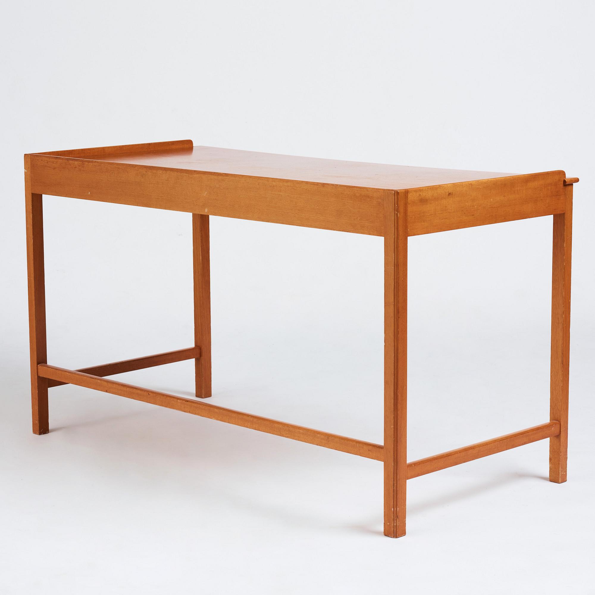 Josef Frank, a mahogany desk, version of model 2115, Firma Svenskt Tenn, Stockholm, Sweden.