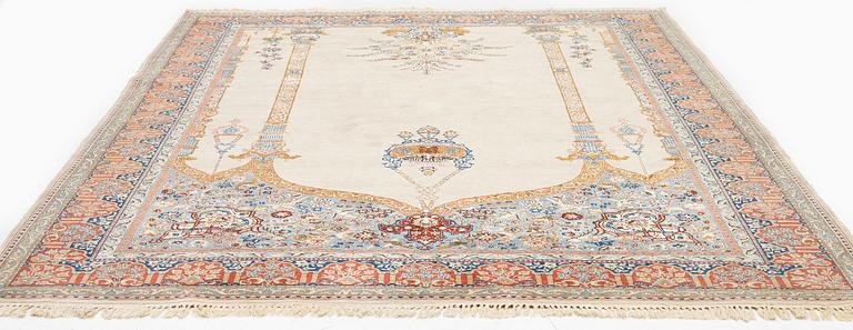 A Tabriz carpet, part silk, Northwest Persia (Iran), c. 323 x 246 cm.