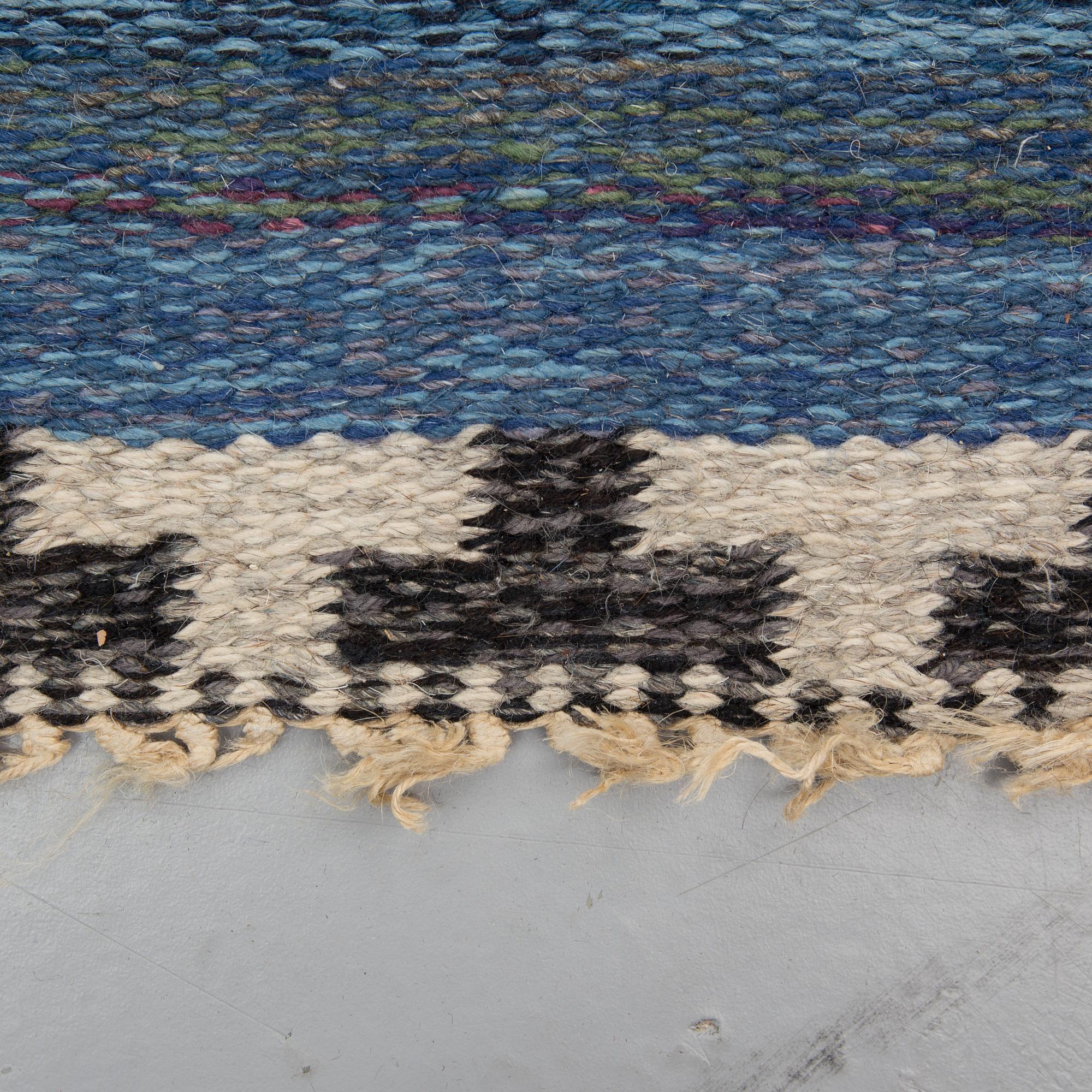 A CARPET, flat weave, atributed to Rakel Carlander, around 306 x 197 cm.