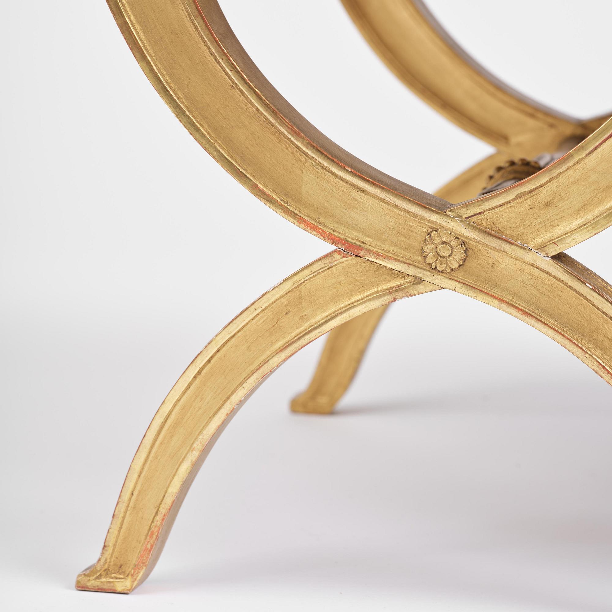 A pair of late Gustavian giltwood stools, Stockholm, late 18th century.