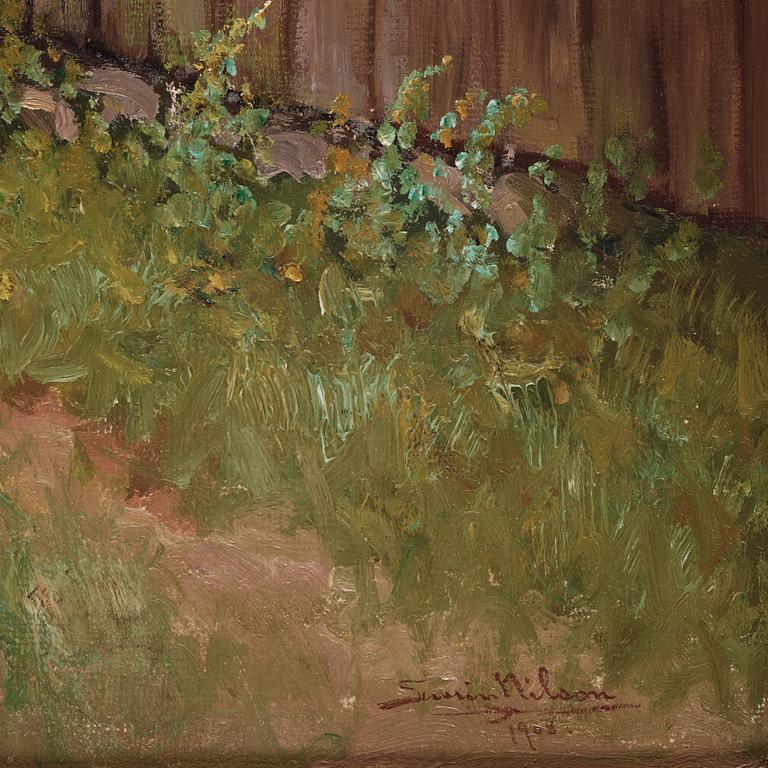 Severin Nilson, Familjebild vid gårdens brunn.