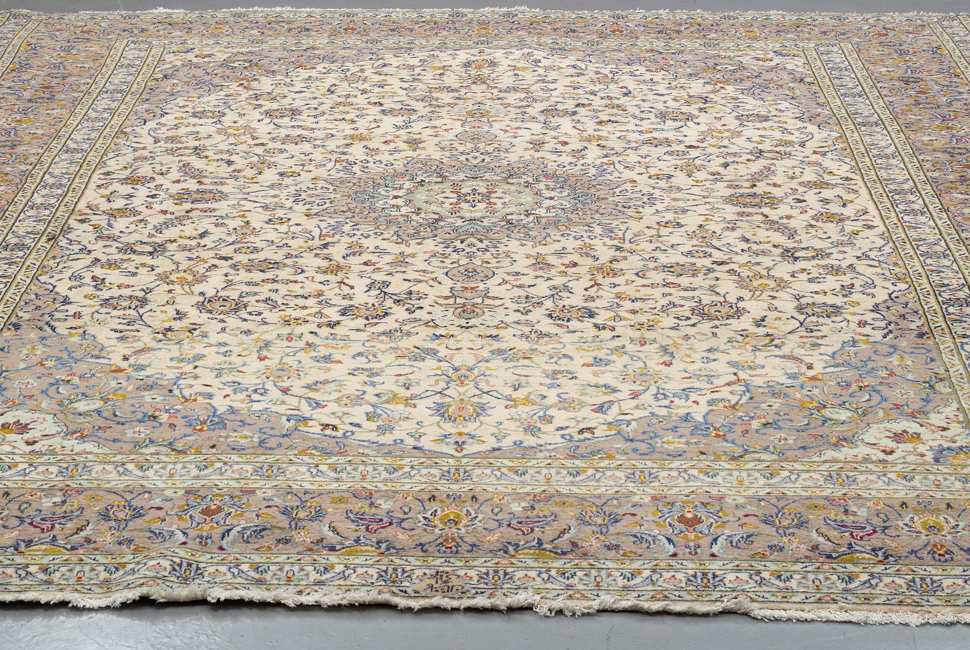A CARPET, Kashan, signed, 385 x 295 cm.