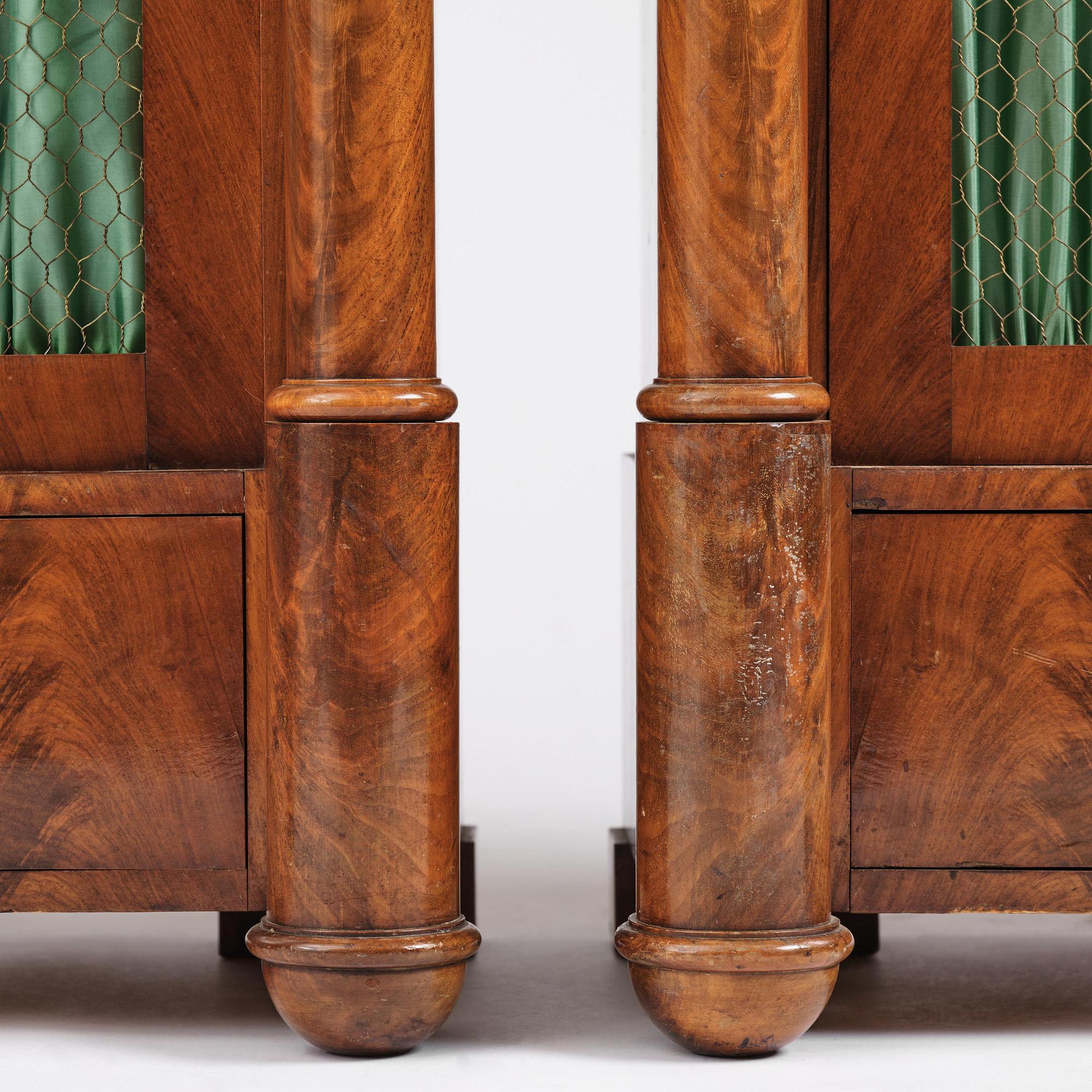 A pair of Swedish Empire mahogany bibliothèques, Stockholm, early 18th century.
