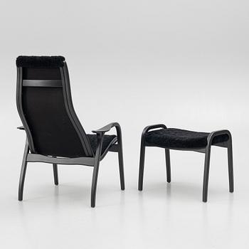Yngve Ekström, a 'Lamino' easy chair with footstool, Swedese, 2018.