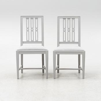 A Gustavian style dining table with twelve chairs, late 20th century.