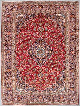 A Keshan rug, 400 x 295 cm.