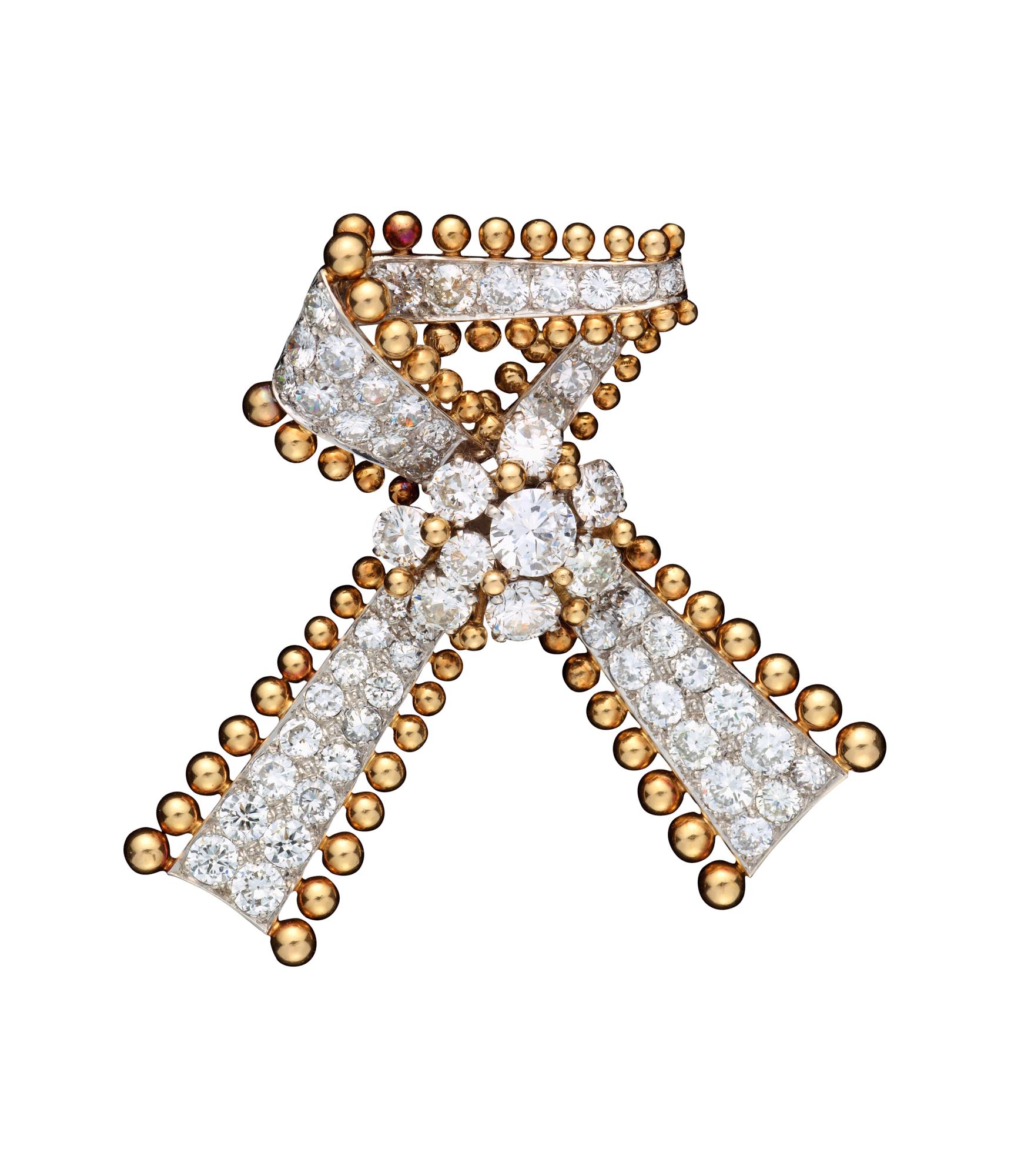 BROSCH, Mauboussin, 64 briljantslipade diamanter, totalt ca 6 ct. Paris 1950-tal.