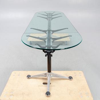 A Bruce Burdick 1980s glass and metall table for Herman Miller/Burdicks groups.