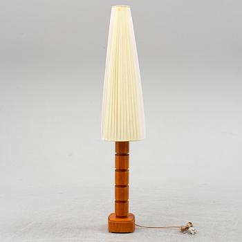 A Möllers Armatur Teak and brass lamp, Eskilstuna, mid 20th Century.