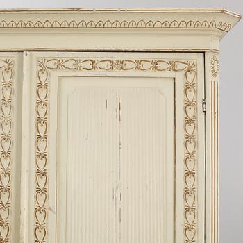 A late Gustavian cabinet, early 19th century.