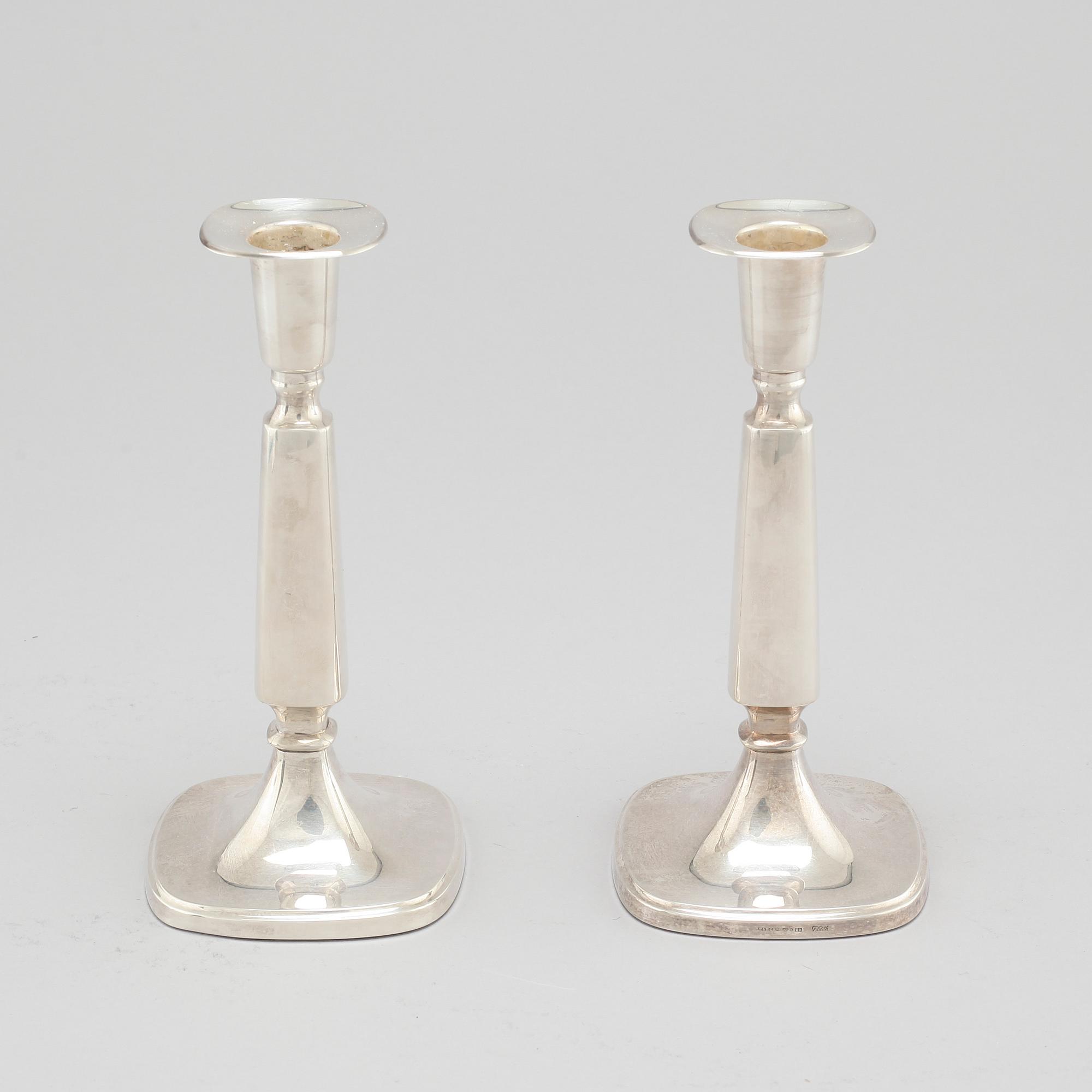 A pair of silver candlesticjs by Tore Eldh for K&EC in Gotheburg, 1970.