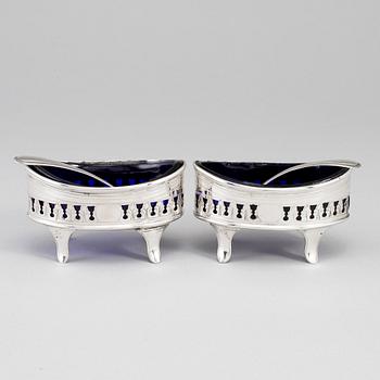 A pair of silver salt cellars, mark of H.