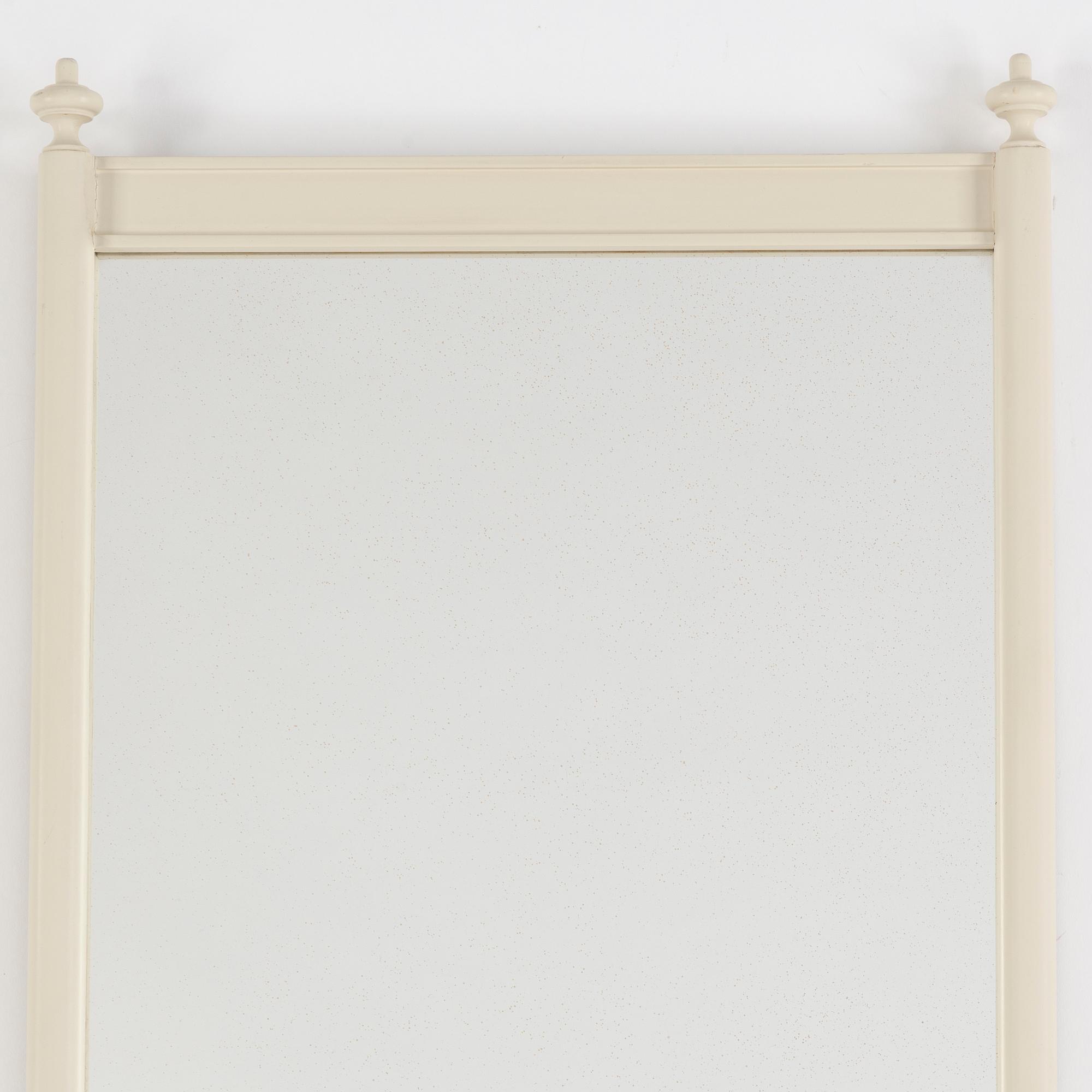 A painted mirror, first half of the 20th Century.