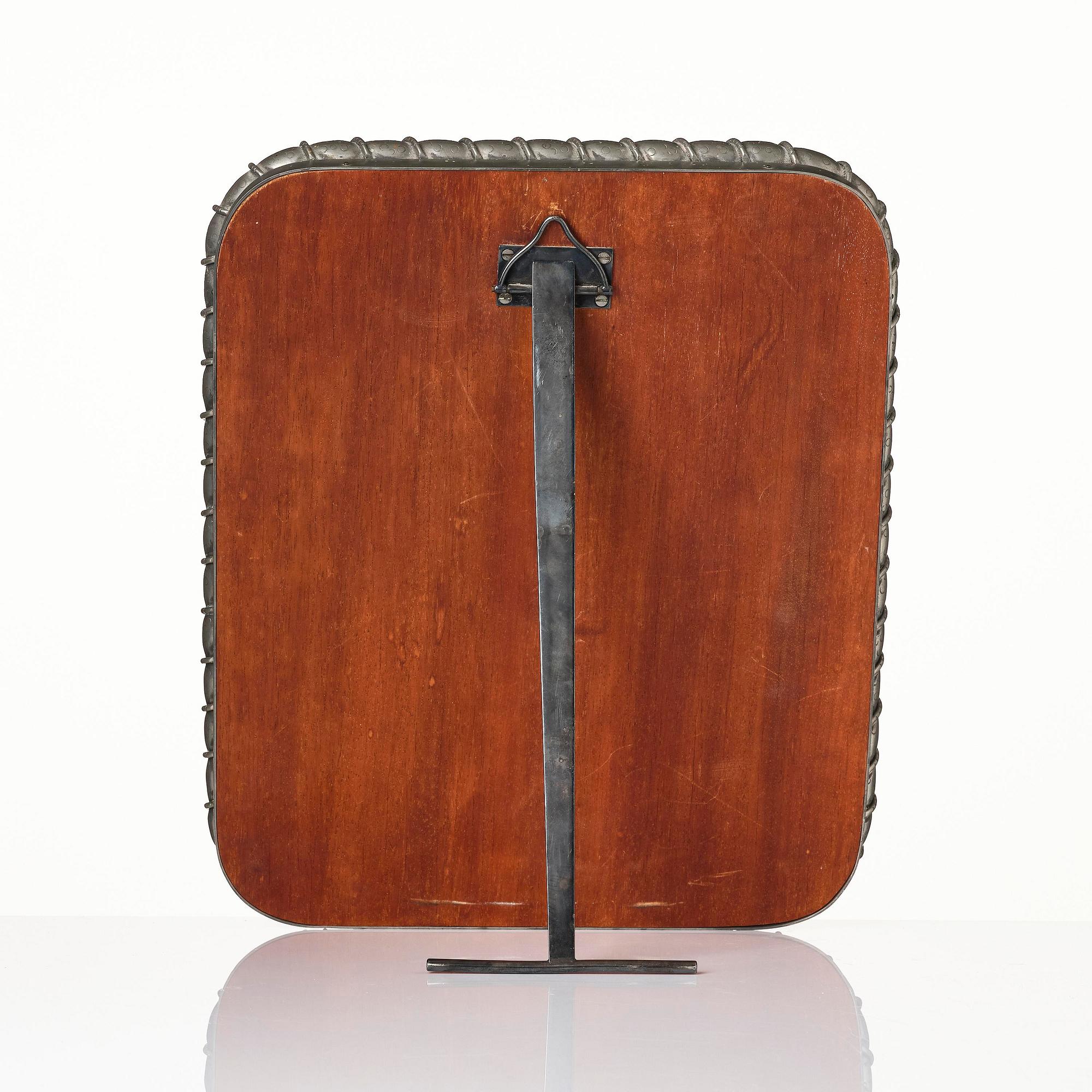 Estrid Ericson, a pewter framed mirror model "A 2518", Firma Svenskt Tenn, Stockholm, 1947.
