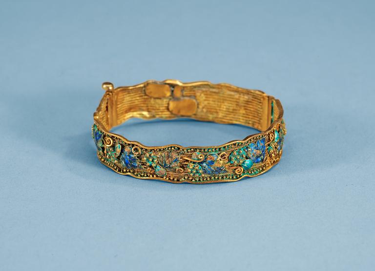 A gilt metal enamelled bracelet, part Tang dynasty. Reworked by Hallberg.
