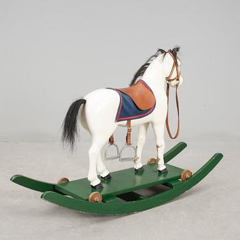 GUNGHÄST, omkring sekelskiftet 1900.