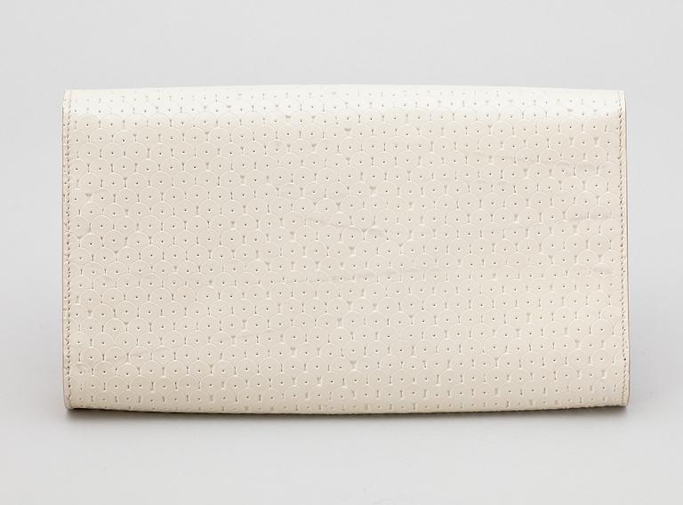 A white leather clutch by Yves Saint Laurent.