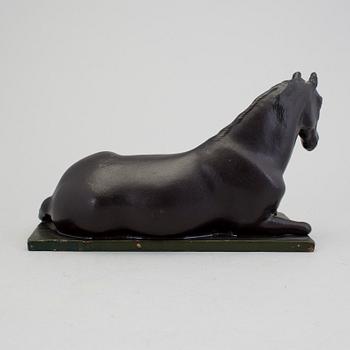 A papier mache horse signed and dated 1799.