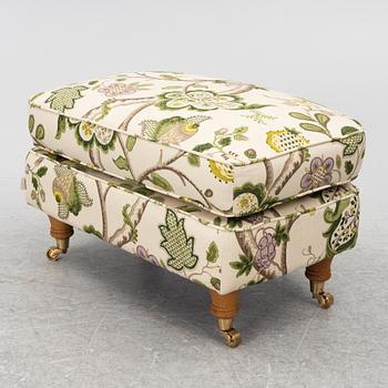 A 'Howard' armchair with footstool, Englesson.