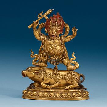 1489. A Sinotibetan gilt bronze and lacquered figure of Yama, Qing dynasty, presumably 18th Century.