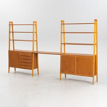 A pair of mid 20th century teak bookshelves.