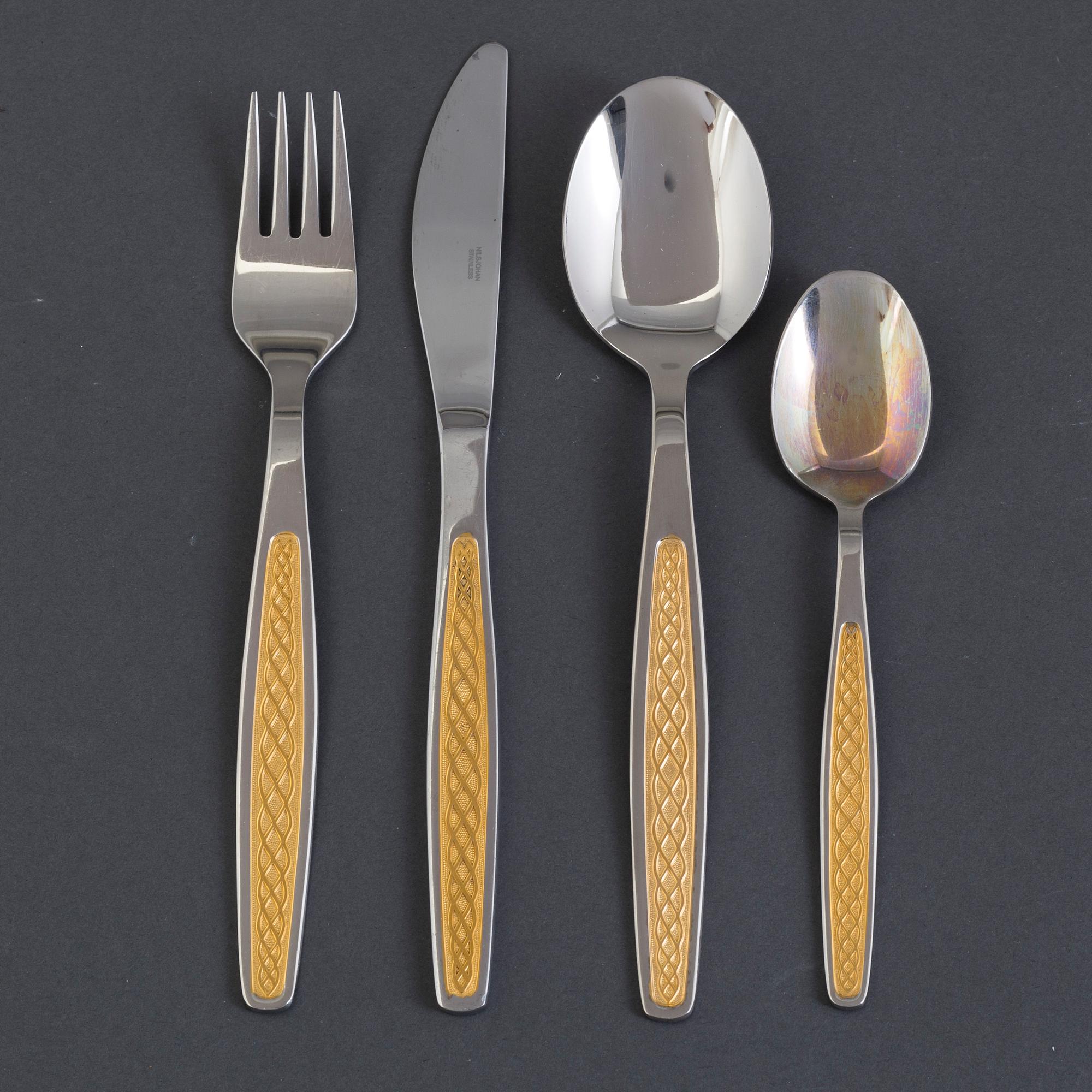 A set of 40 pieces "Guldi" stainless steel flatware, "Norse" decoration in gold, Nils Johan, Sweden, mid 20th century.