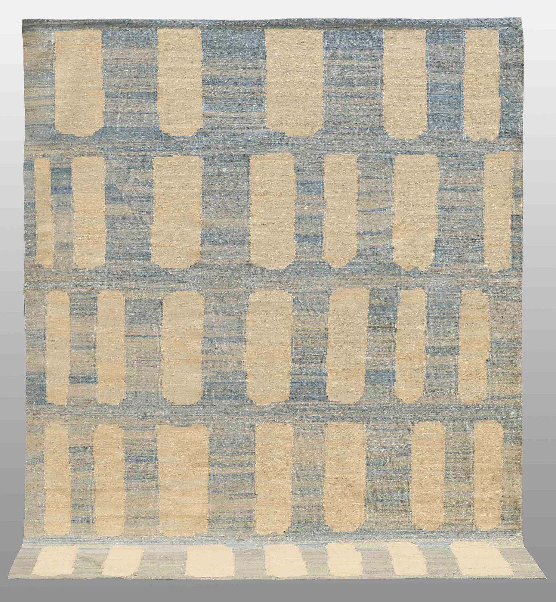 A flatweave rug, 285 x 222 cm.