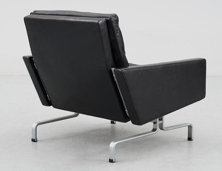 A Poul Kjaerholm 'pk-31' black leather easy chair for E Kold Christensen, Denmark, maker's mark in the steel.