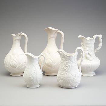 FIVE SIMILAR PARIAN JUGS, Gustafsberg, second half of the 19th century.