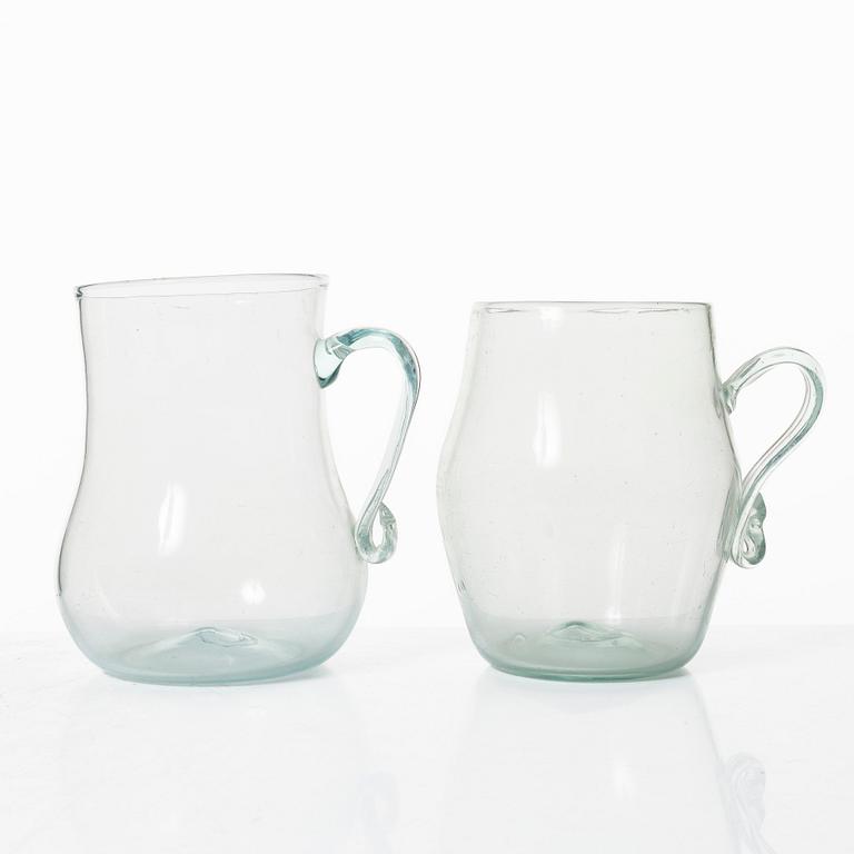 A set of two Swedish glass tankards, early 19th century.