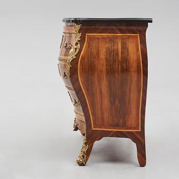 A rococo parquetry and gilt brass-mounted commode possibly by C. Åhman (master in Stockholm 1748-1783).