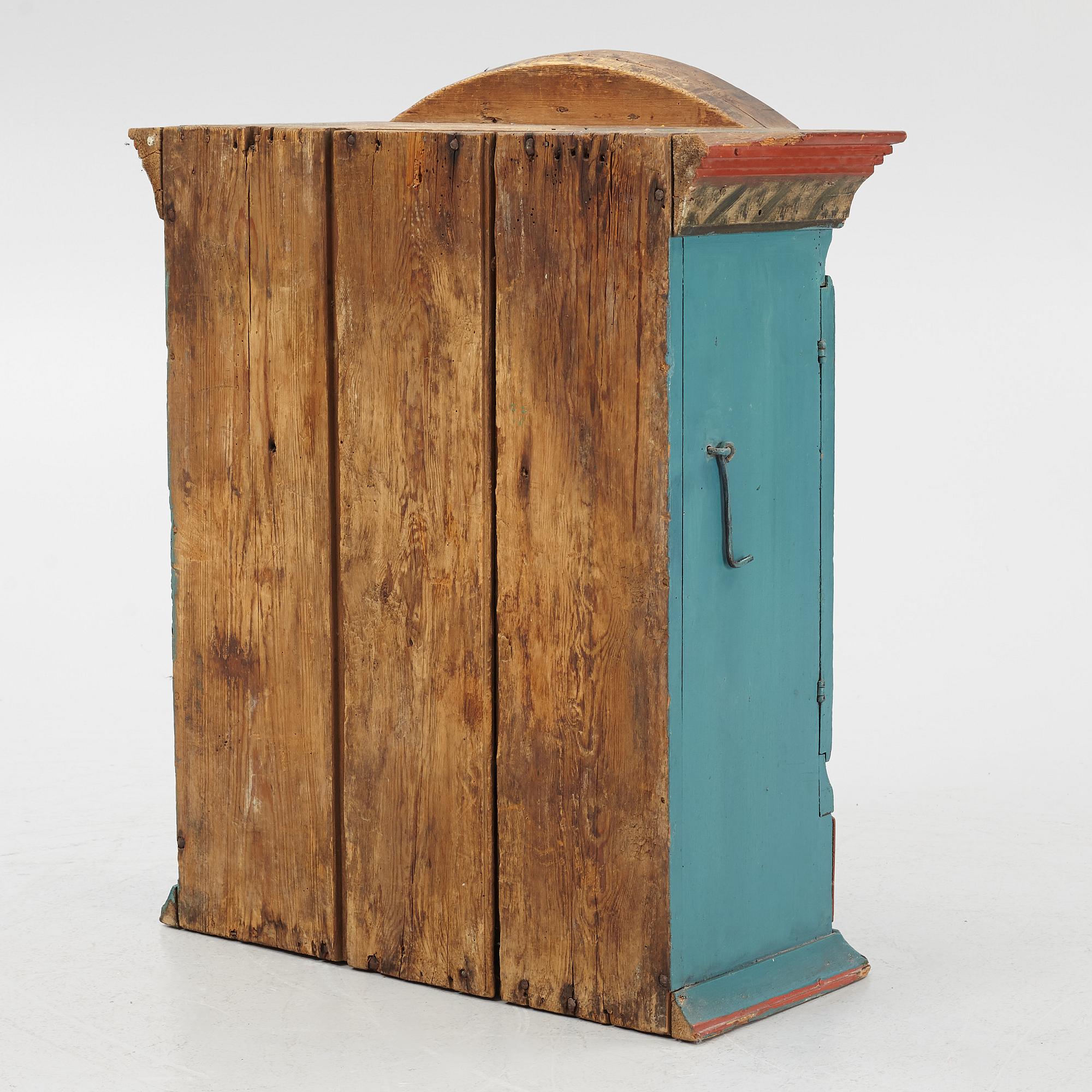A Swedish provincial wall cabinet, possibly from Dalarna, early 19th century.