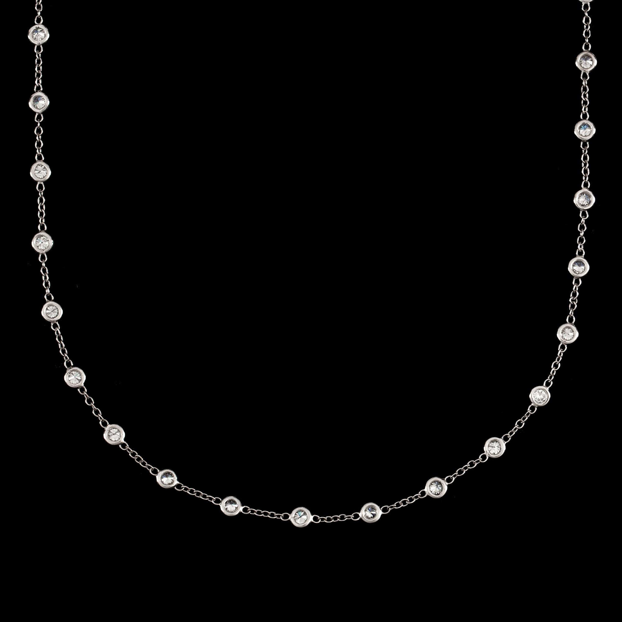 A brilliant-cut diamond longchain necklace. 82 diamonds, total carat weight circa 8.96 cts.