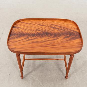A model 974 mahogany side table by josef Frank for Firma Svenskt Tenn, post 1985,  designed in 1938.