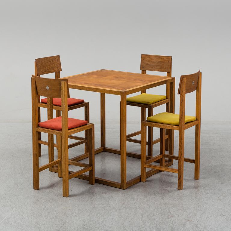MARIO PRANDINA, an oak table and four chairs, Plinio Il Giovane, Italy.