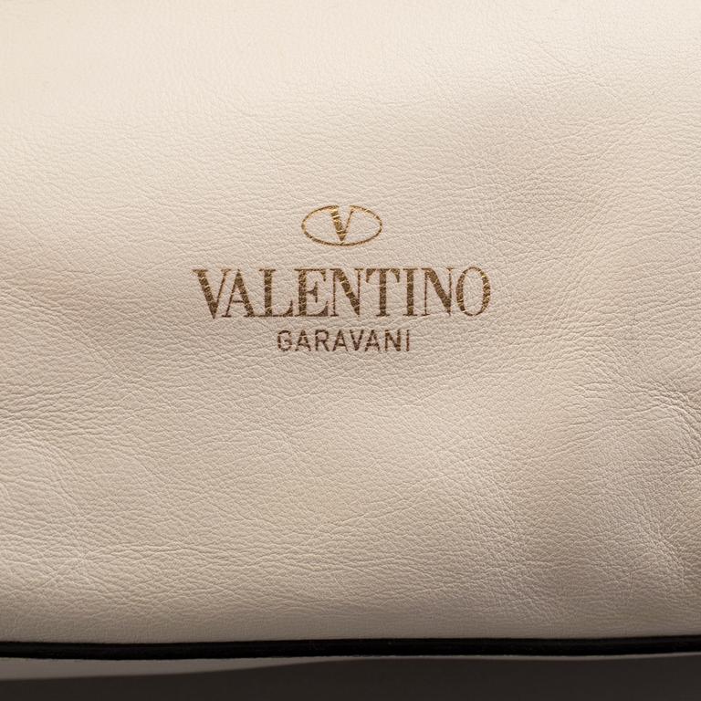 Bag by Valentino.