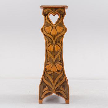 An early 20th century art nouveau shelf.