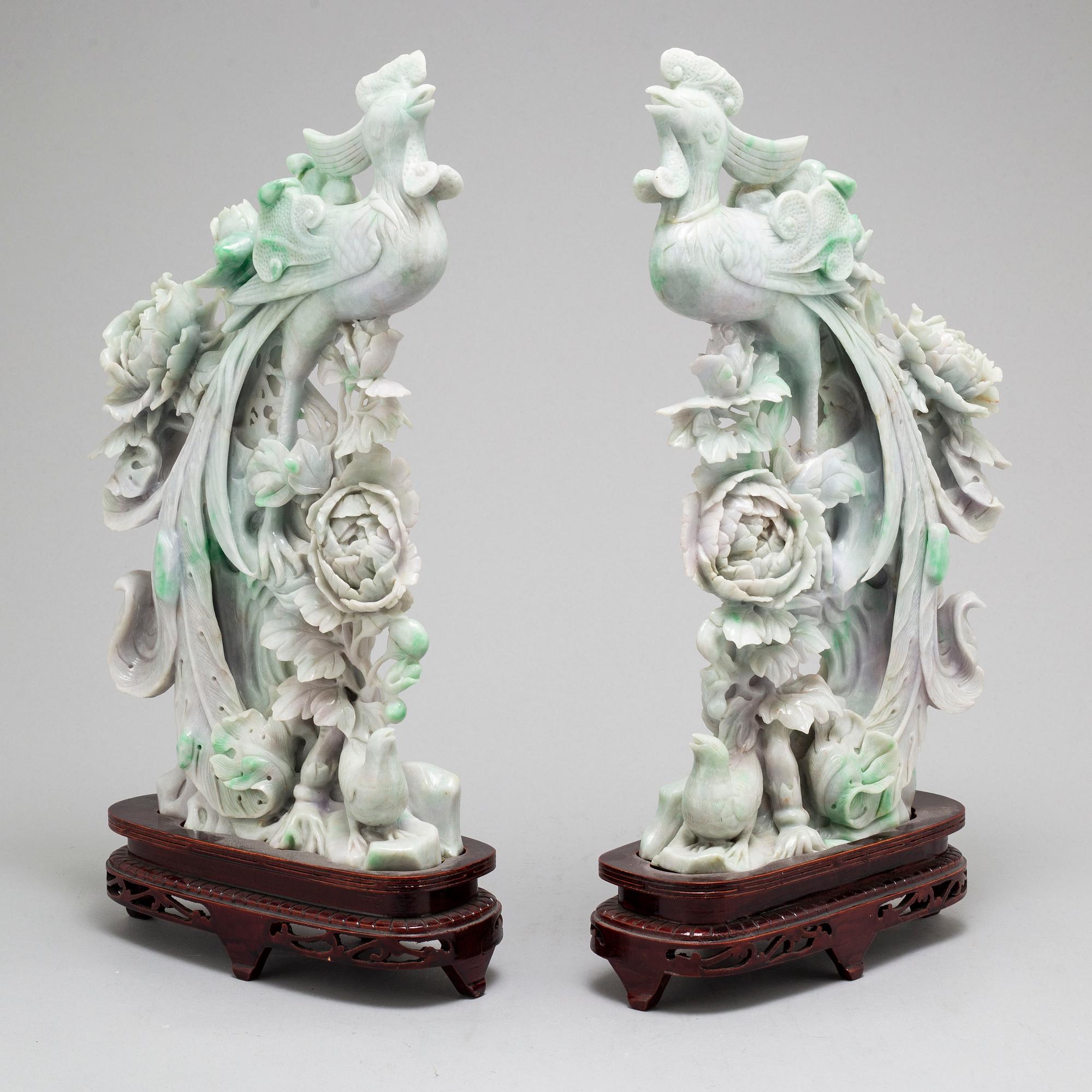 A pair of Chinese modern pale green and pale mauve stone carvings/sculptures, 20th century.
