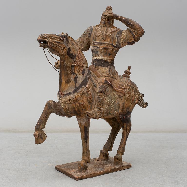 A large modern Chinese wooden sculpture.